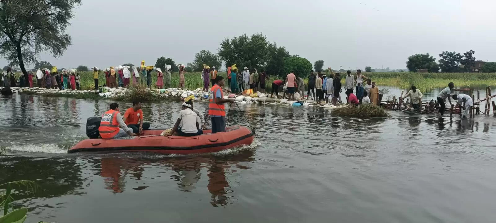 NDRF personnel busy in repairing the broken drain