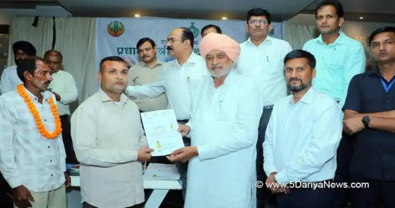 Agriculture and Farmers' Welfare Minister Distributes Insurance Policies to Farmers